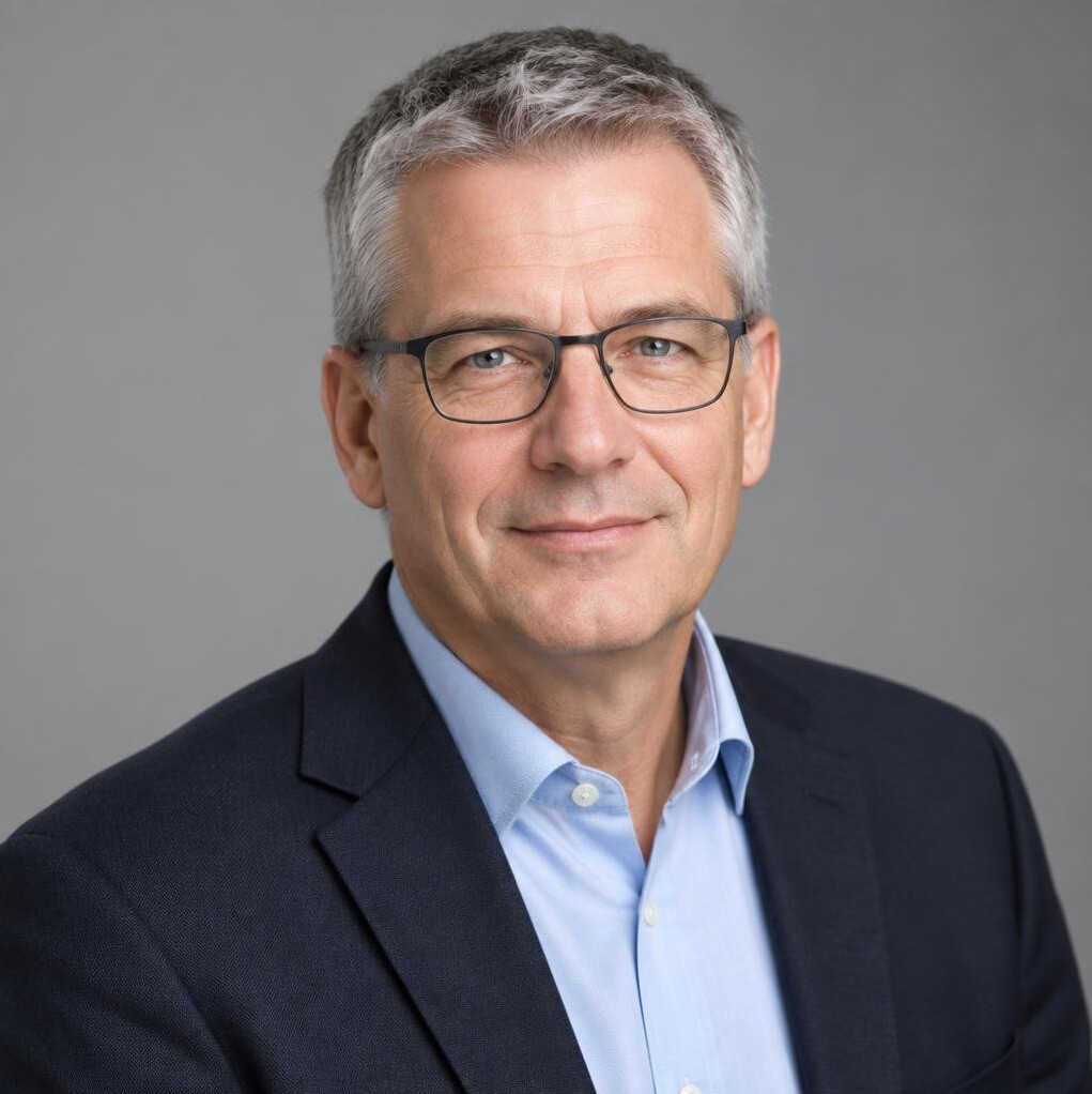 Studio portrait of a German man in his fifties, head of survey methodology